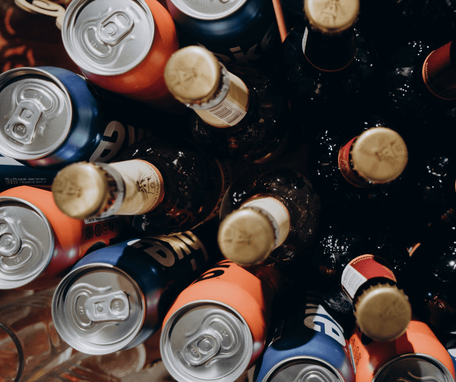 overhead view of beer bottles and cans