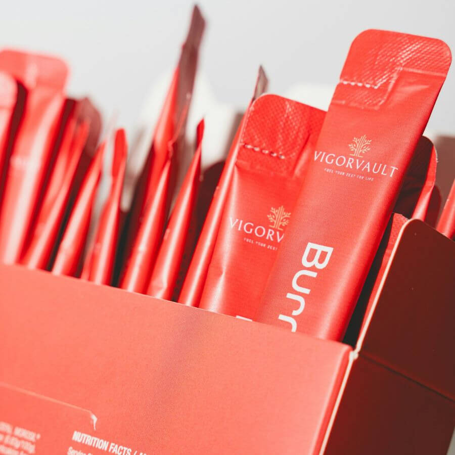 collection of red stick packs in a red carton