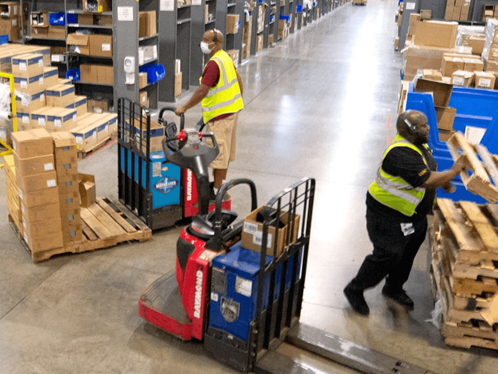 warehouse workers on forklifts